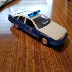 Georgia State Patrol Road Champs die cast police car 1:43 scale
